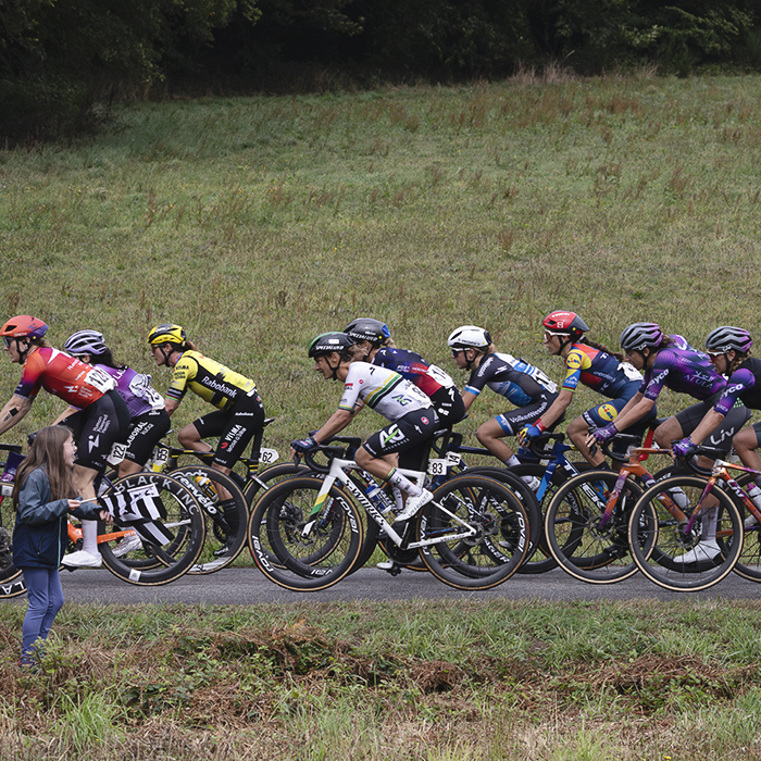 Classic Lorient Agglomération - Ceratizit 2025 - A young girl waves a Breton flag and shouts support  as the peloton passes