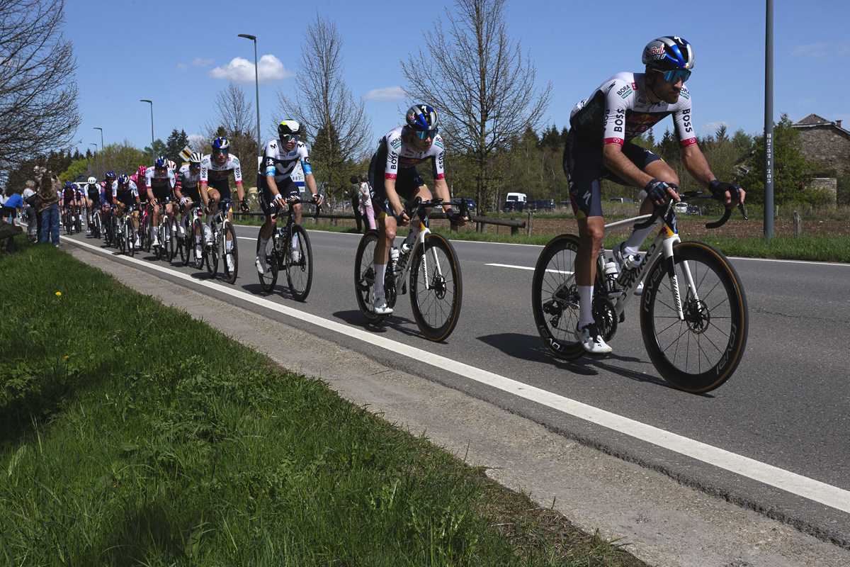 Liege Bastogne Liege 2025 - The Red Bull - BORA - hansgrohe team lead a group of riders at Baraque de Fraiture