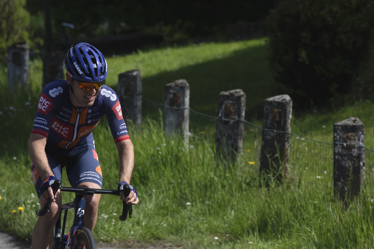 Liege Bastogne Liege 2025 - Chris Hamilton rides past fields