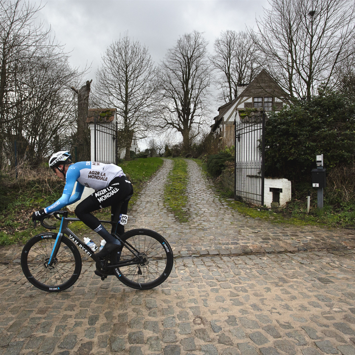 Omloop Het Nieuwsblad 2024 - Sander de Pestel of Decathlon AG2R La Mondiale Team passes a gateway on Haaghoek