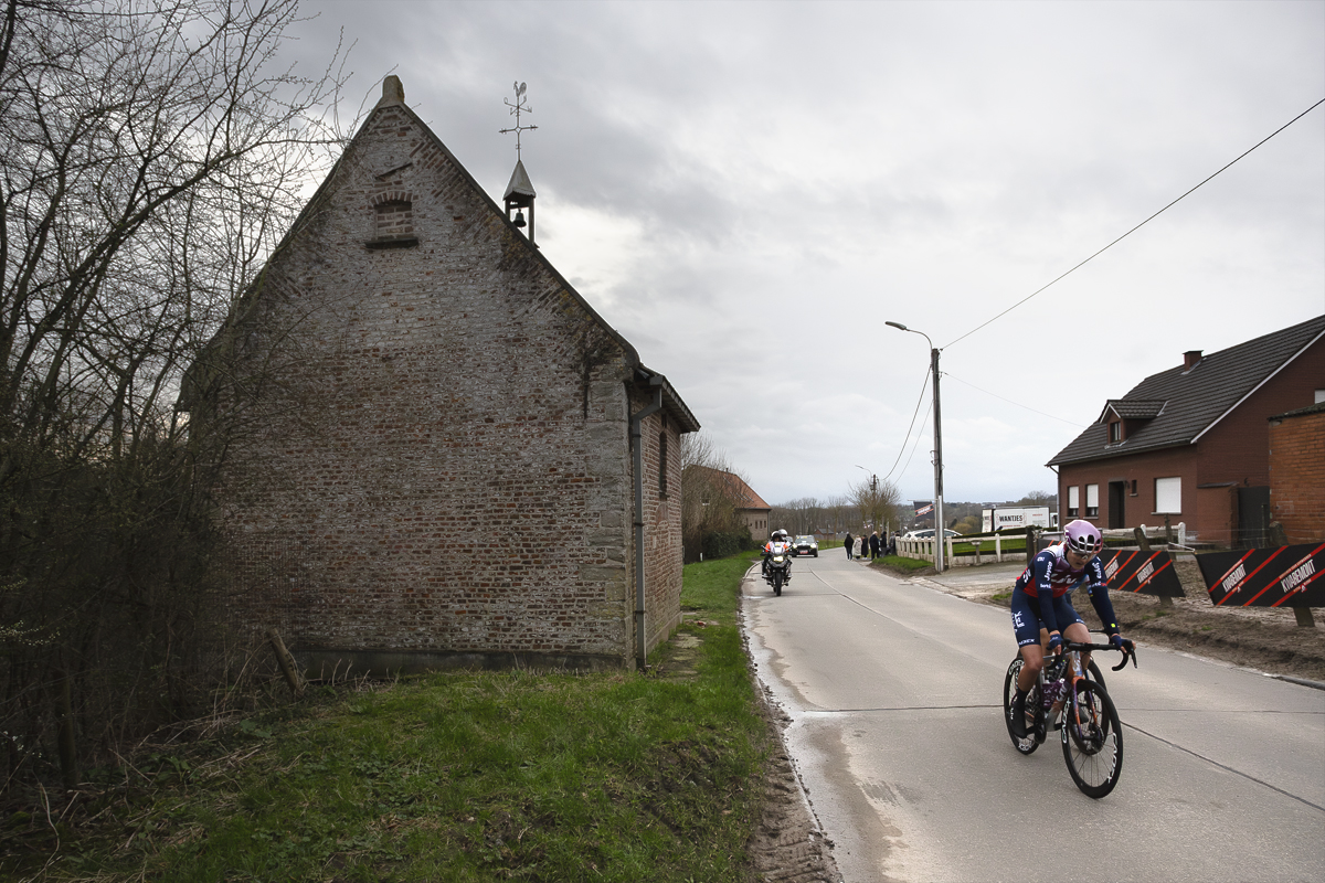 Omloop Het Nieuwsblad Vrouwen 2024 - Jeanne Korevaar of Liv AlUla Jayco, passes a chapel on Kapellestraat