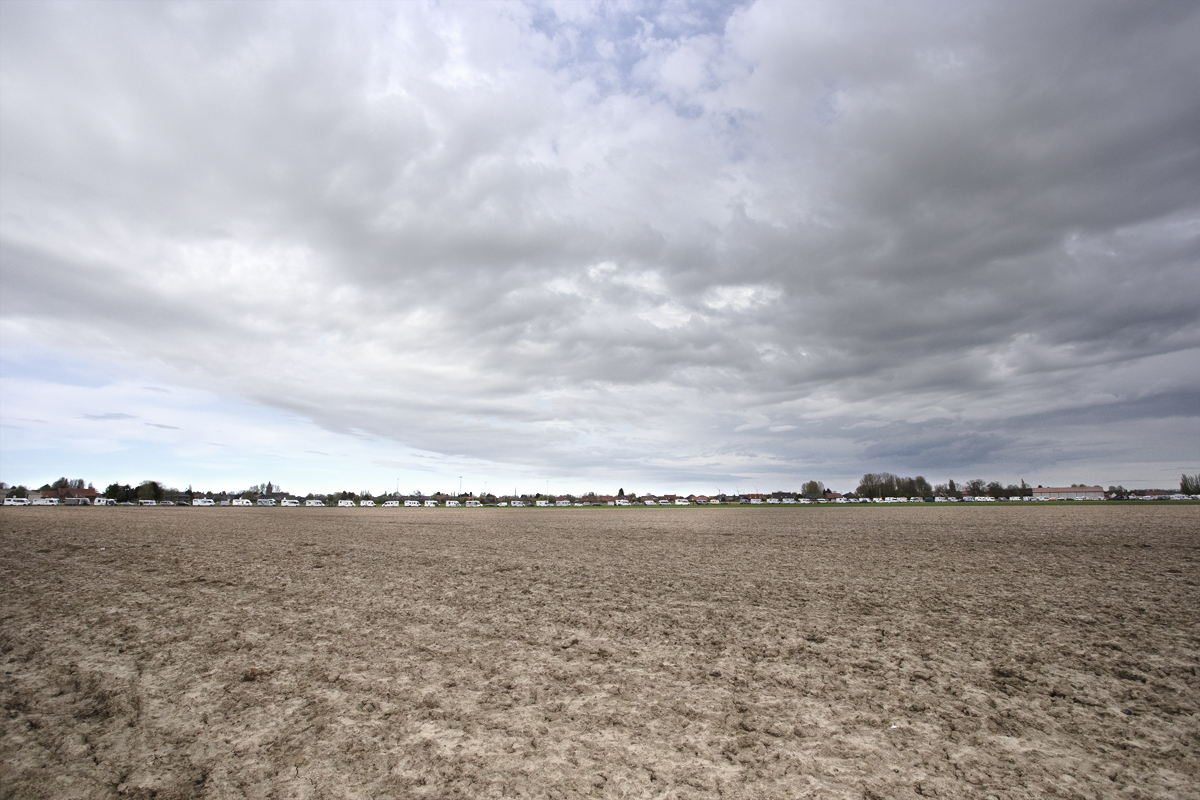 Paris Roubaix 2024 - Camper vans line the course on Camphin-en-Pévèle