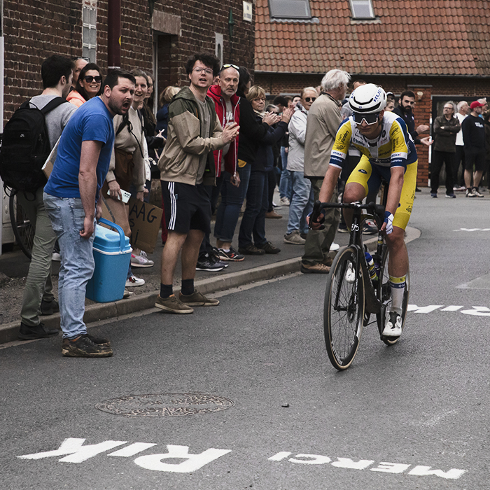Paris Roubaix 2024 - A fan with a cool box in Camphin-en-Pévèle cheers on Victor Vercouillie