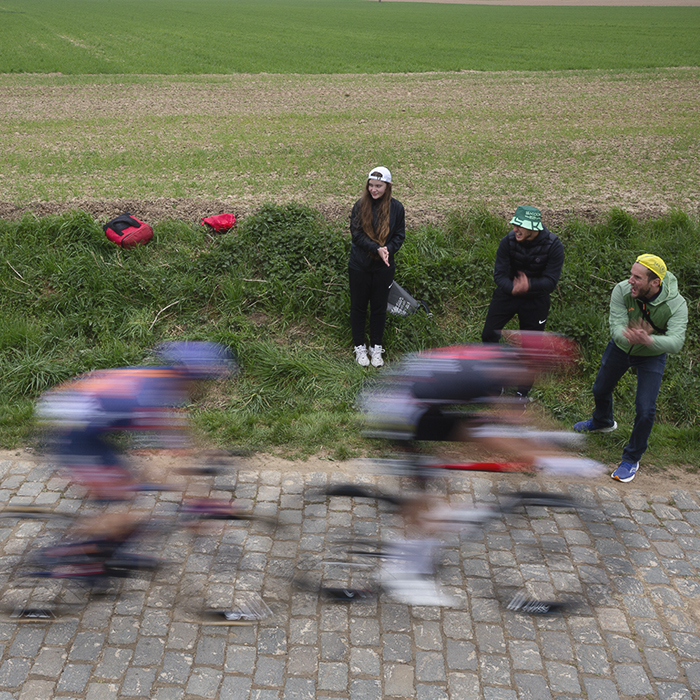 Paris Roubaix 2025 - Fans encourage the speeding riders onwards