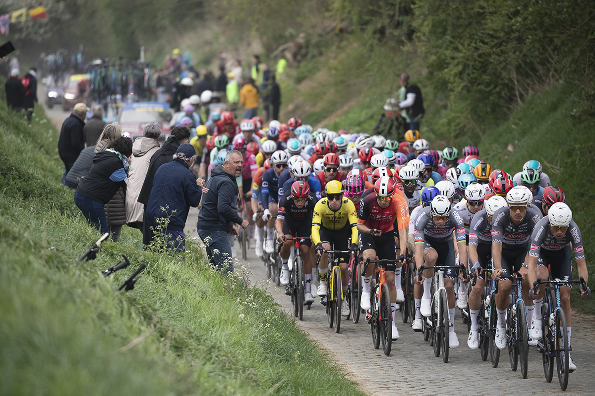 Paris Roubaix 2025 - The peloton rides down the high banked sector of Maing À Monchaux-Sur-Écaillon