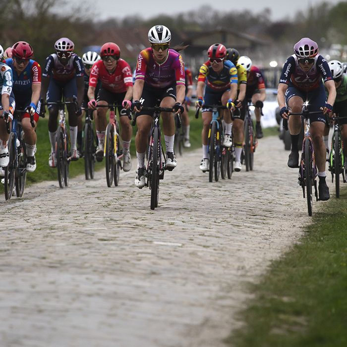 Paris Roubaix Femmes 2024  - A group of riders on the Cysoing à Bourghelles sector