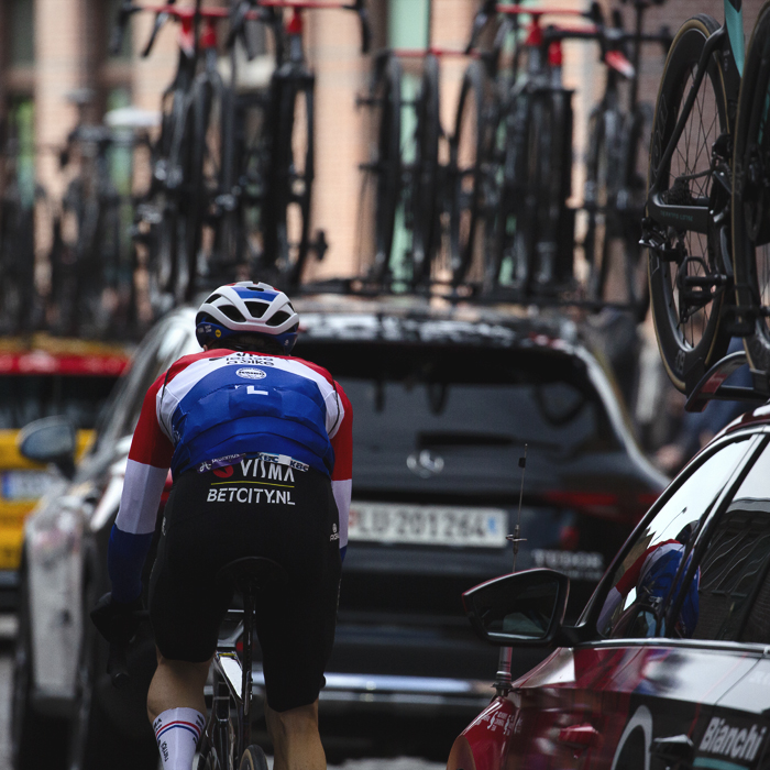 Ronde van Vlaanderen 2024 - Dylan van Baarle rides in among the team cars