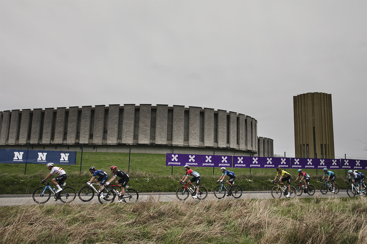 Ronde van Vlaanderen 2024 - Riders race in front of the Drinkwaterreservoir in Brakel
