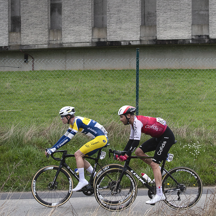 Ronde van Vlaanderen 2024 - Siebe Deweirdt and Nicolas Debeaumarché pass the Drinkwaterreservoir