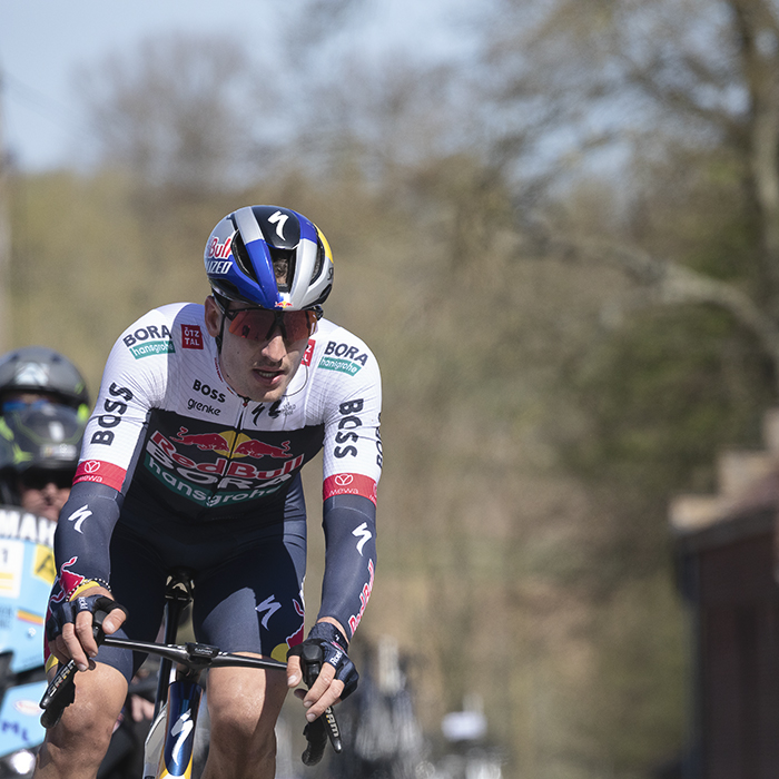 Ronde van Vlaanderen 2025 - Tim van Dijke rides next to a grand wall