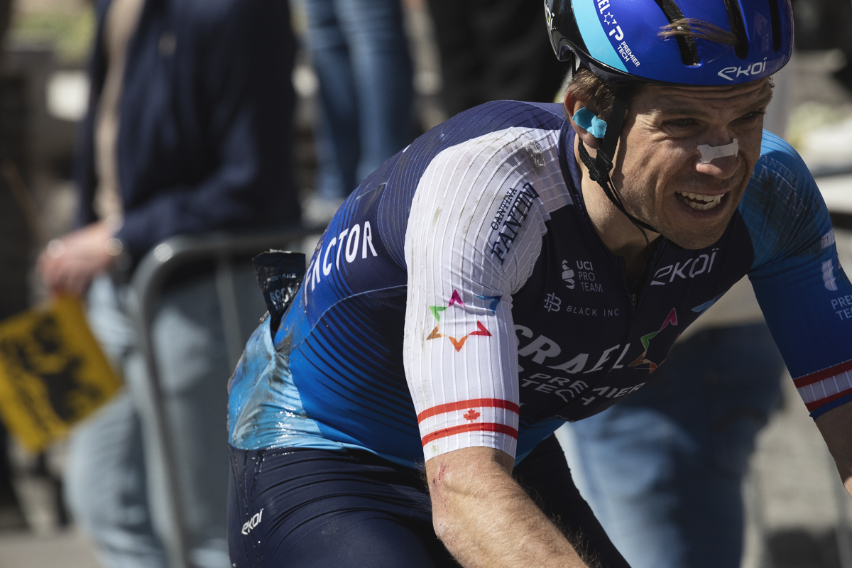 Ronde van Vlaanderen 2025 - Guillaume Boivin the pain showing on his face as he climbs Wolvenberg