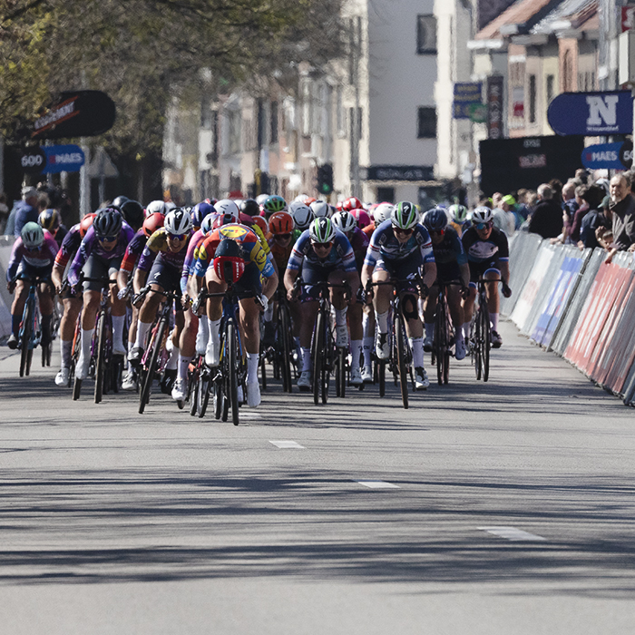 Scheldeprijs Vrouwen 2025 - Head down, a rider pushes forward to gain advantage on the finish straight