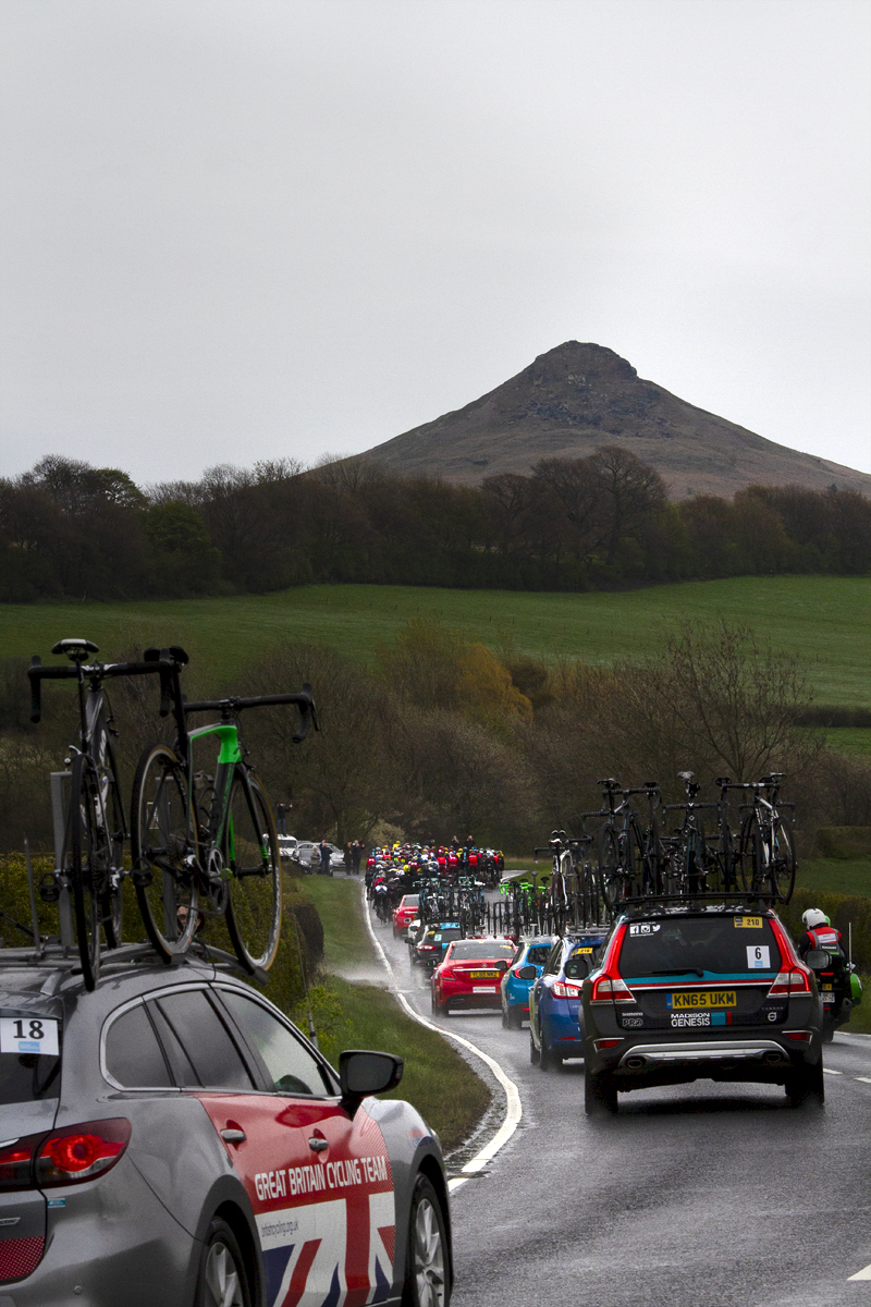 Tour de Yorkshire 2016 - The race convoy follows the peloton with Roseberry Topping clearly visible in the background