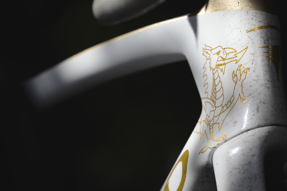 Tour of Britain 2025 - A close up of the gold outlined white Dragon on Geraint Thomas’ Custom Pinarello Dogma F bike