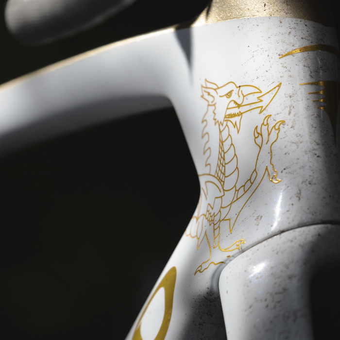 Tour of Britain 2025 - A close up of the gold outlined white Dragon on Geraint Thomas’ Custom Pinarello Dogma F bike