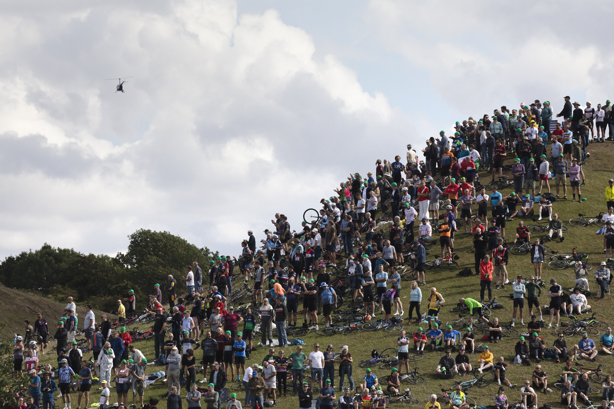 Tour of Britain 2025 - Fans crowd the hill at Burton Dassett