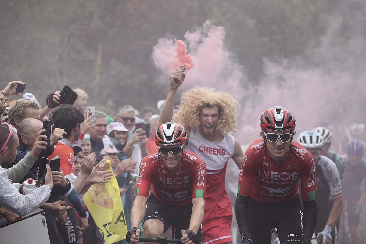 Tour of Britain 2025 - Ben Swift and Geraint Thomas are chased up Caerphilly mountain by a bearded cheerleader wielding a red flare