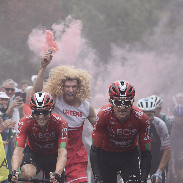 Tour of Britain 2025 - Ben Swift and Geraint Thomas are chased up Caerphilly mountain by a bearded cheerleader wielding a red flare