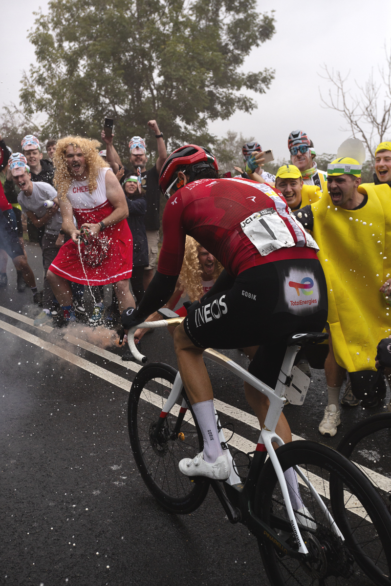 Tour of Britain 2025 - Geraint Thomas is given a fitting send off as men dressed as cheerleaders spray champagne and others dressed as bananas cheer him on