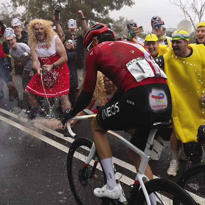 Tour of Britain 2025 - Geraint Thomas is given a fitting send off as men dressed as cheerleaders spray champagne and others dressed as bananas cheer him on