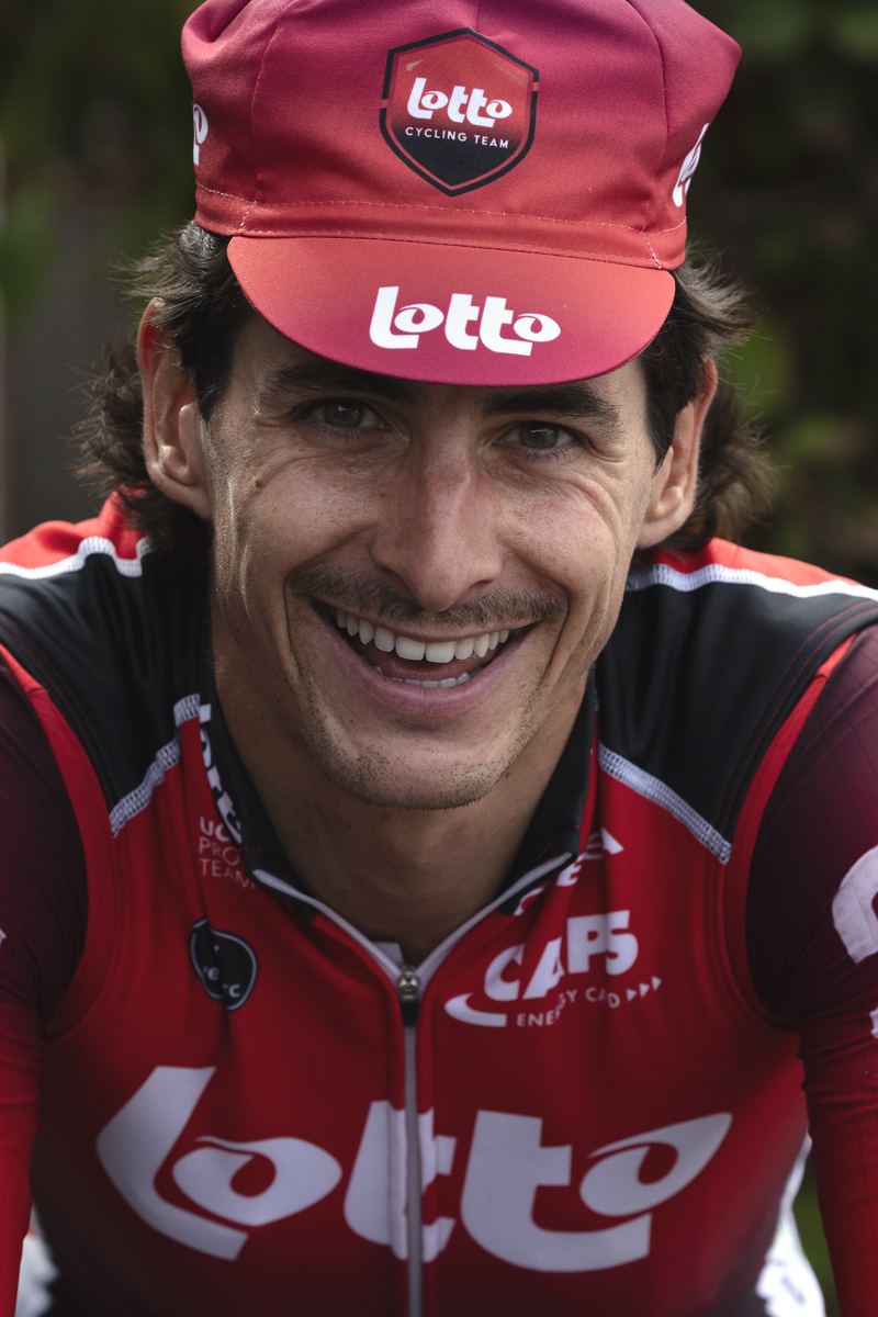 Tour of Britain 2025 - Cedric Beullens of Lotto smiles while wearing a small Lotto branded cap old skool