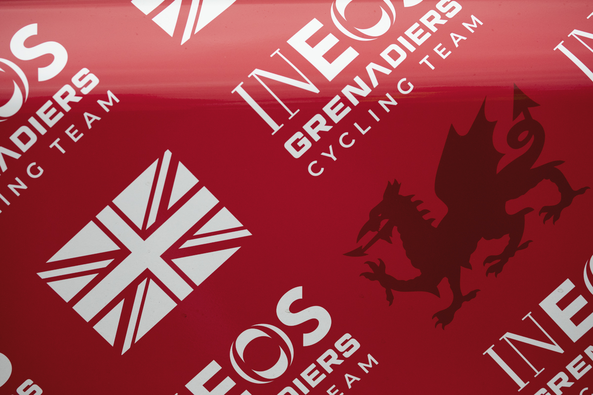 Tour of Britain 2025 - The Ineos Grenadiers team car bearing the Welsh Dragon in honour of Geraint Thomas’ last race