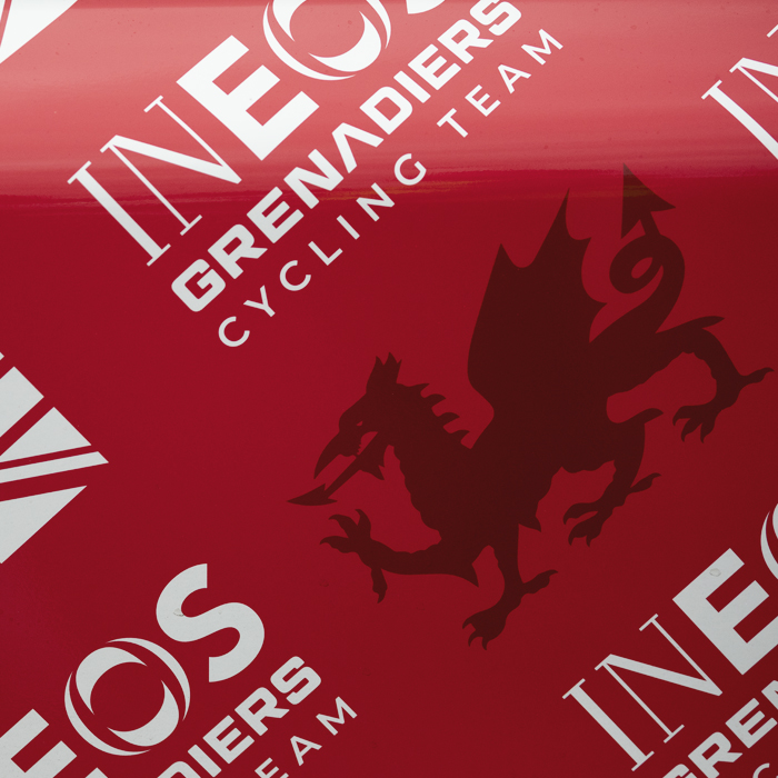 Tour of Britain 2025 - The Ineos Grenadiers team car bearing the Welsh Dragon in honour of Geraint Thomas’ last race