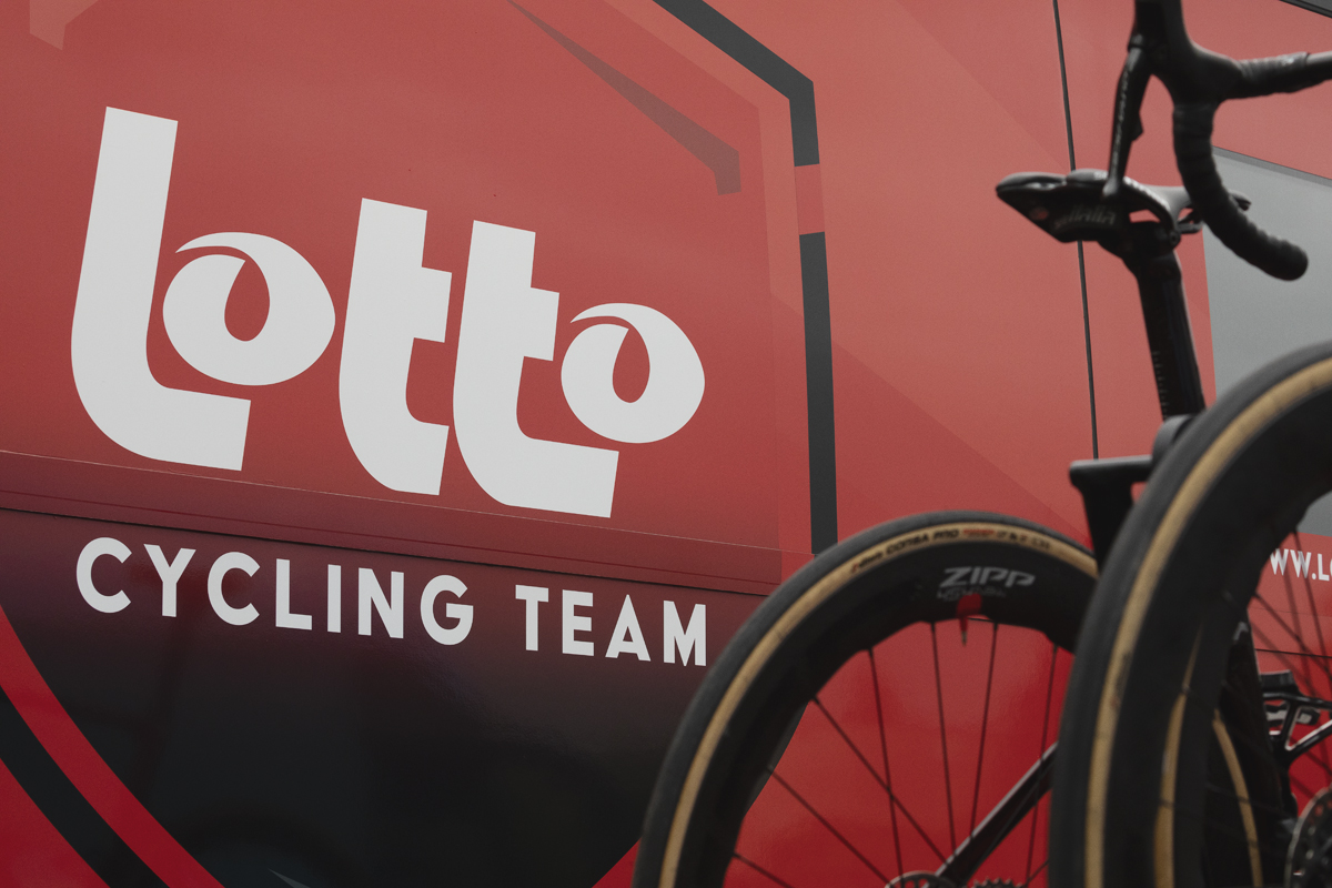 Tour of Britain 2025 - The Lotto cycling team bus with their bikes on a team car in the foreground