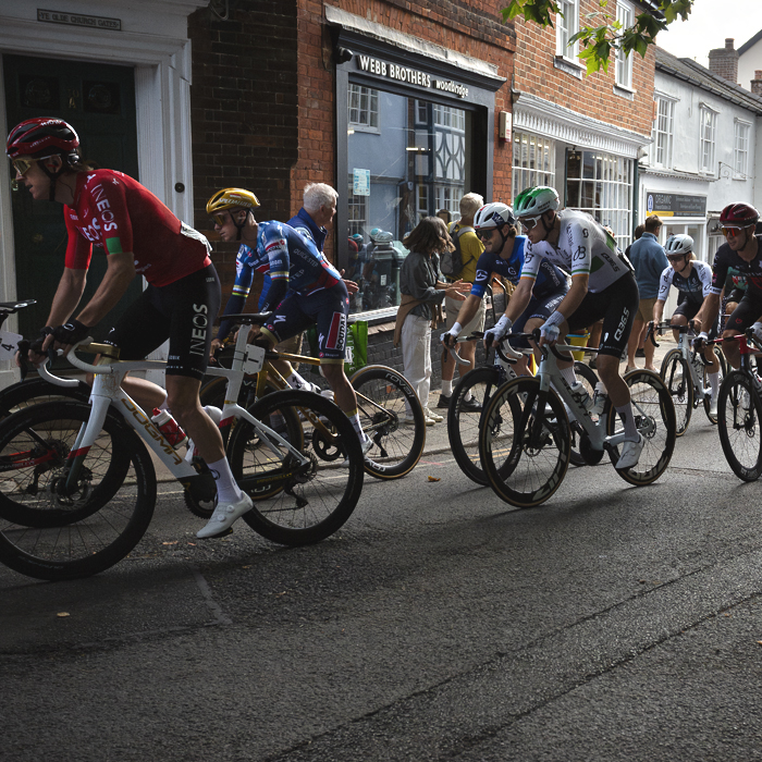 Tour of Britain 2025 - Riders roll through the shopping streets of Woodbridge at the start of the race