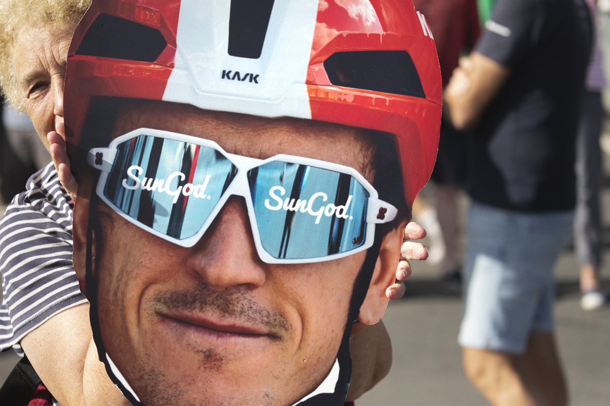 Tour of Britain 2025 - A fan holds a giant cut out of Geraint Thomas’ face