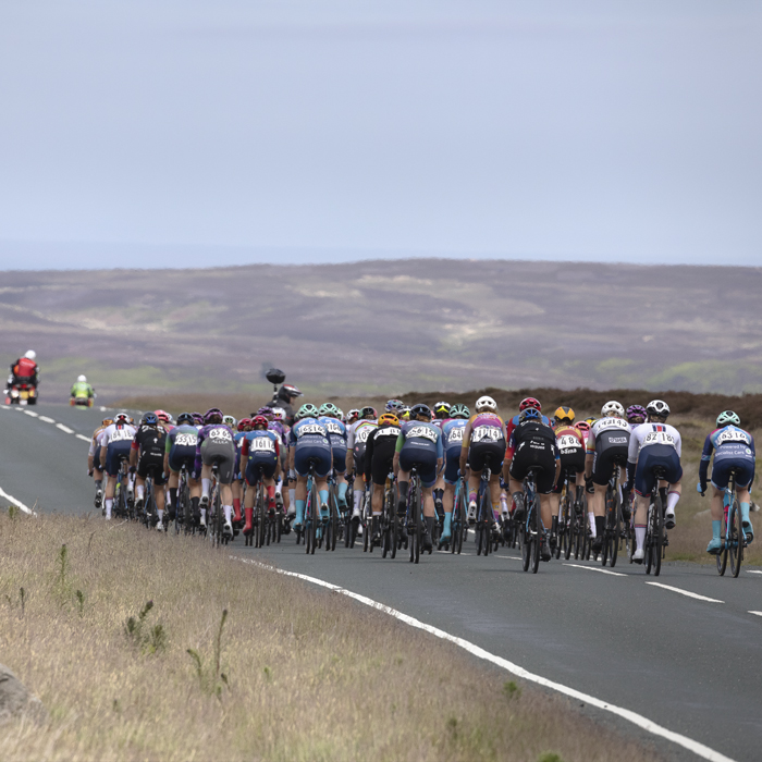 Tour of Britain Women’s 2025 - Stage 1 - Rear view of the riders as they pass over Blakey Ridge