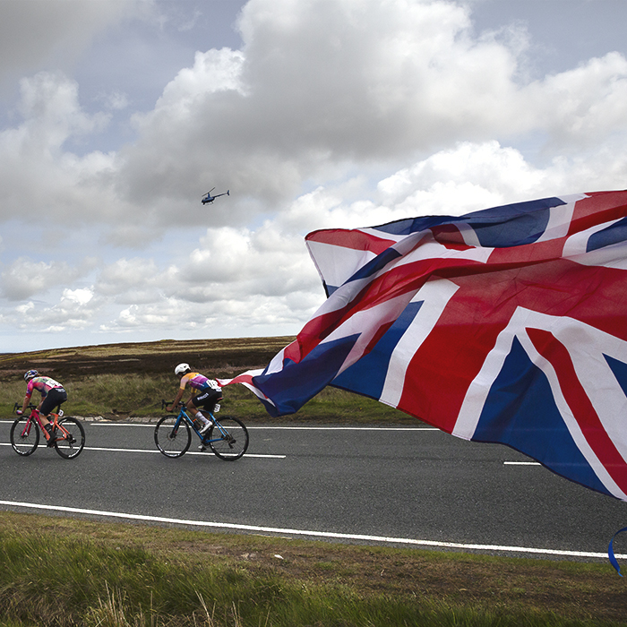 Tour of Britain Women’s 2025 - Stage 1 - A Union Jack flies as riders pass by on Blakey Ridge
