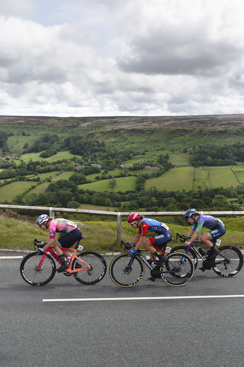 Tour of Britain Women’s 2025 - Stage 1 - Blakey Ridge a small group of riders with stunning Yorkshire scenery as a backdrop