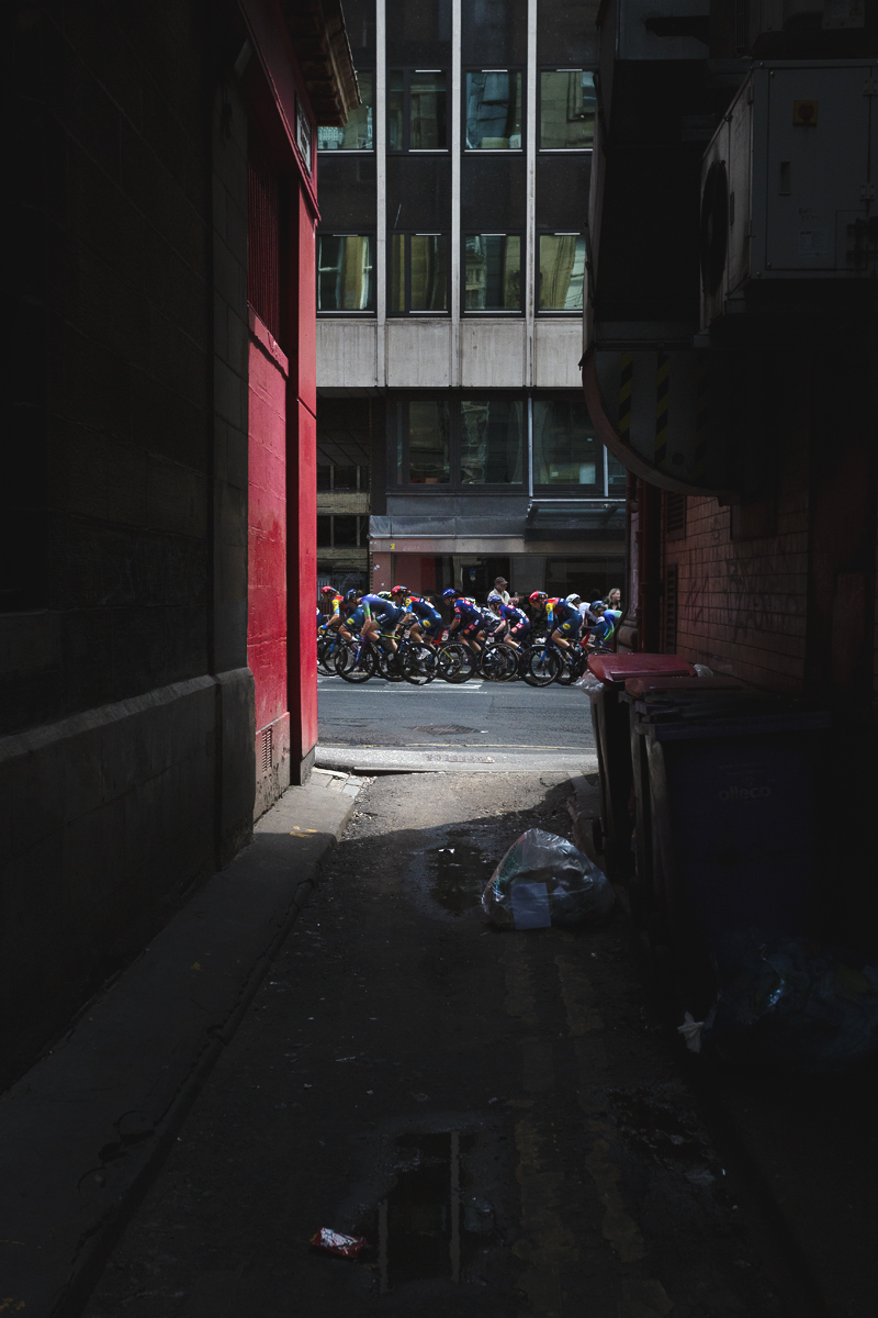 Tour of Britain Women’s 2025 - Stage 4 - The peloton framed by St Mary’s Lane and its detritus