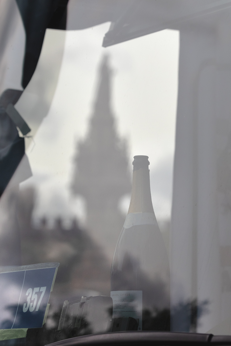 Tour of Britain Women’s 2025 - Stage 4 - An empty champagne bottle in the front of a team bus with Doulton Fountain in the background