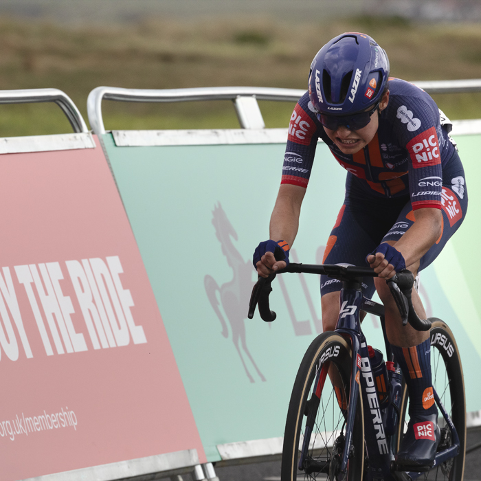 Tour of Britain Women’s 2025 - Stage 1 - Mara Roldan passes British Cycling hoardings