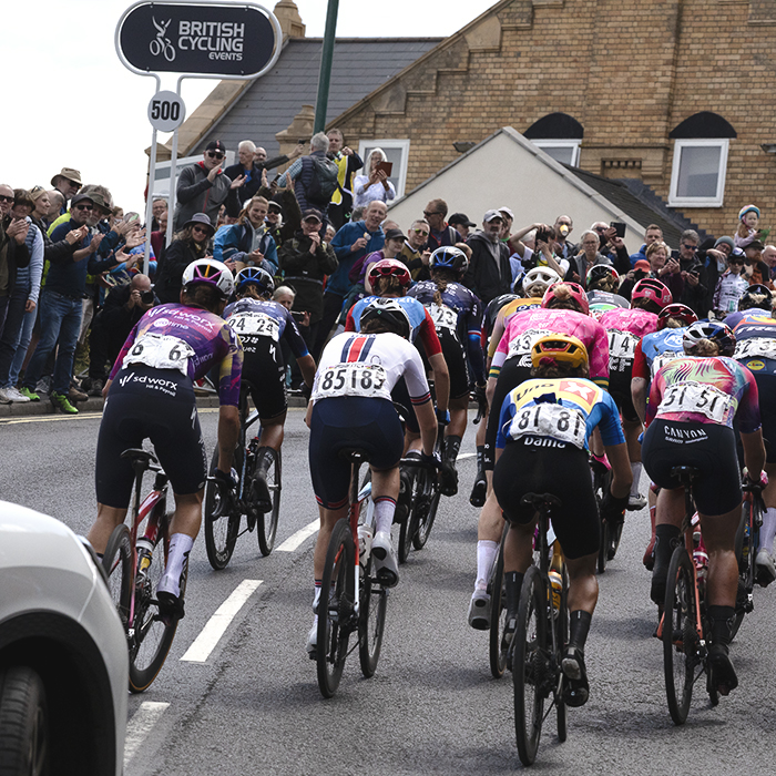 Tour of Britain Women’s 2025 - Stage 2 - A rear view of riders on the climb at Saltburn-by-the-Sea