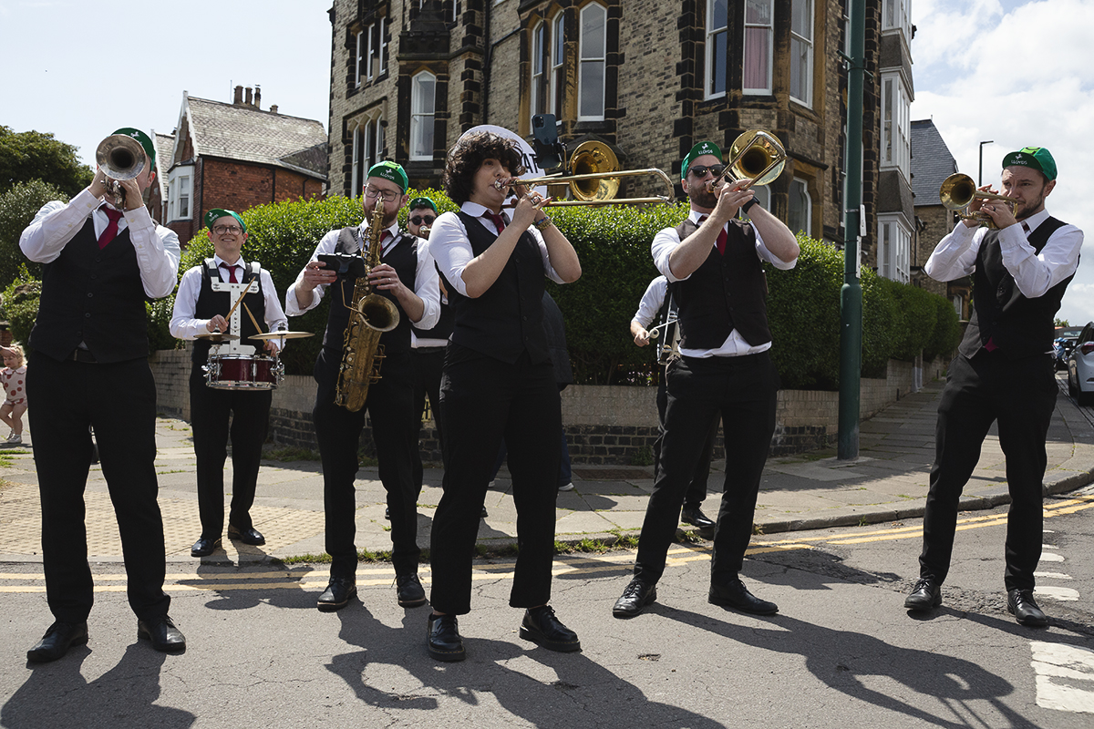 Tour of Britain Women’s 2025 - Stage 2 - Back Chat Brass play for the crowds at Saltburn-by-the-Sea