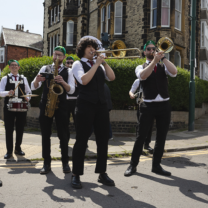 Tour of Britain Women’s 2025 - Stage 2 - Back Chat Brass play for the crowds at Saltburn-by-the-Sea