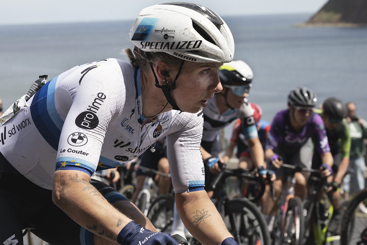 Tour of Britain Women’s 2025 - Stage 2 - Lorena Wiebes with the sea in the background as she tackles the climb at Saltburn