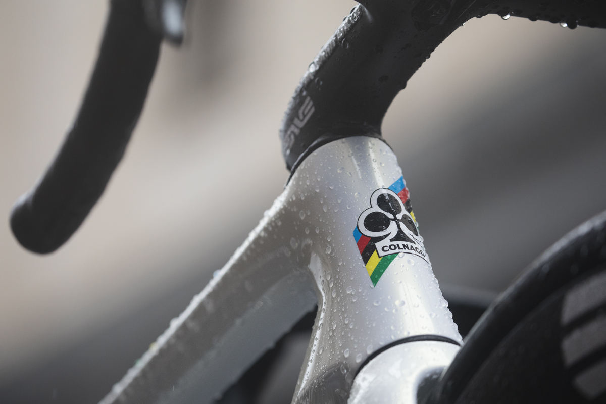 Tre Valli Varesine 2024 - Close up of the Colnago logo and rainbow bands on the bike