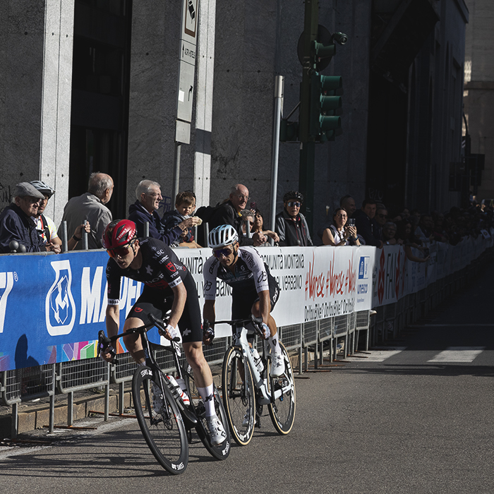 Tre Valli Varesine 2025 - Michael Storer and Gianluca Brambilla pass by speactators
