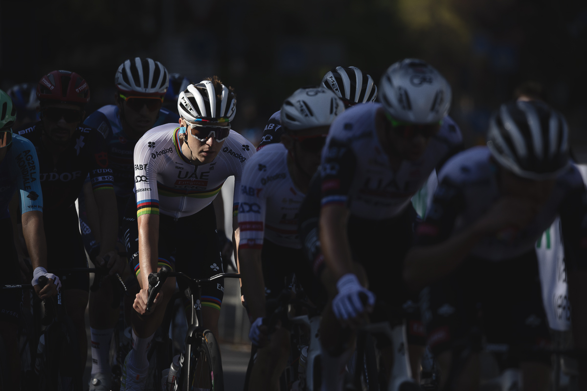 Tre Valli Varesine 2025 - An illuminated Tadej Pogačar tucked in behind his team mates during the race