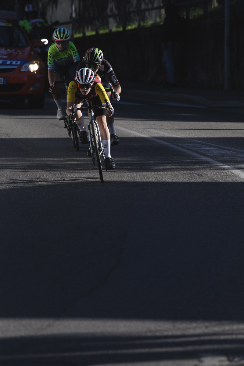 Tre Valli Varesine Women’s Race 2025 - A rider assumes a tuck position as she leads a group