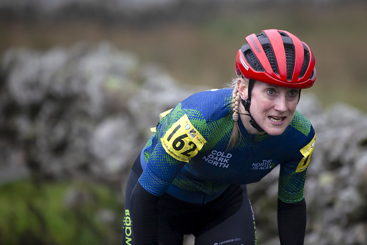 UK National Hill Climb Championships 2023 - Gemma Sargent shows determination on her face as she climbs The Struggle